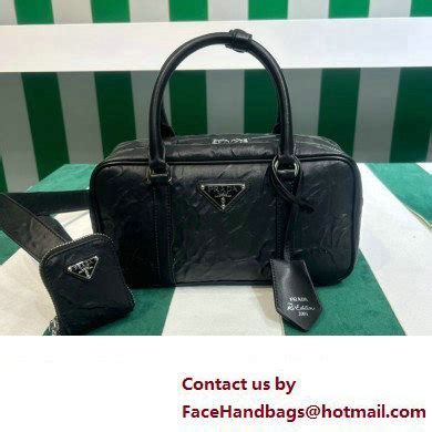 prada 1bb098|Black Small antique nappa leather top handle bag .